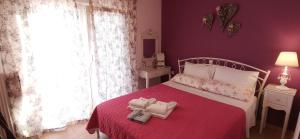 Posteľ alebo postele v izbe v ubytovaní Iris Deluxe Suites 1
