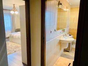 Kúpeľňa v ubytovaní Apartamenty u Magika