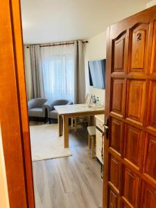 Posedenie v ubytovaní Apartamenty u Magika