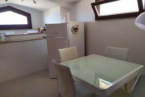 A kitchen or kitchenette at Trilocale in centro storico a Spoleto