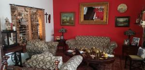 אזור ישיבה ב-Mendoza’s Guest House
