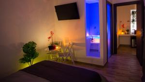 ETNEA 208 LUXURY JACUZZI SUITE Catania客房内的一张或多张床位