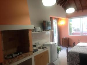 Η κουζίνα ή μικρή κουζίνα στο Casa da Isabelinha +28 φωτογραφίες