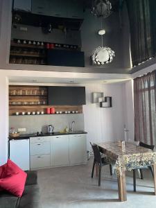 Kuchyň nebo kuchyňský kout v ubytování Aparthotel Alfa