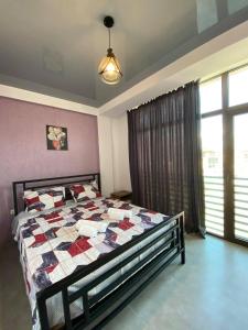 Postel nebo postele na pokoji v ubytování Aparthotel Alfa