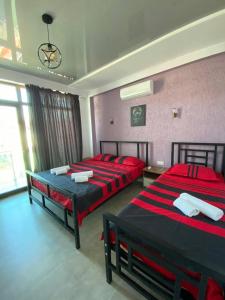 Postel nebo postele na pokoji v ubytování Aparthotel Alfa