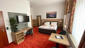 Voodi või voodid majutusasutuse Hotel Friedchen mit eigener Fleischerei toas