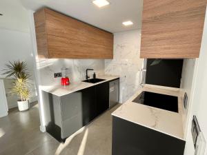 Kuchyňa alebo kuchynka v ubytovaní Luxury boutique playa Silgar