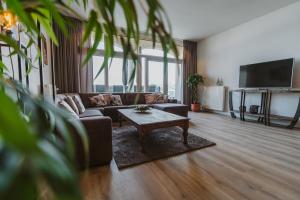 Posezení v ubytování Appartement in Zeeland - Kabbelaarsbank 2E - Port Marina Zélande - Ouddorp