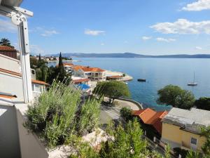 a view of a body of water from a building at Apartman Tina Selce in Selce
