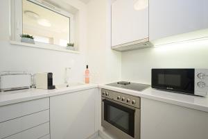 Kjøkken eller kjøkkenkrok på Second Home Luxury Apartman