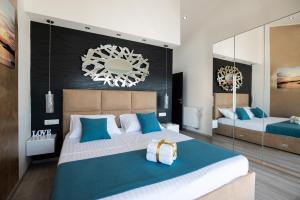 Postel nebo postele na pokoji v ubytování Euroholiday apartments