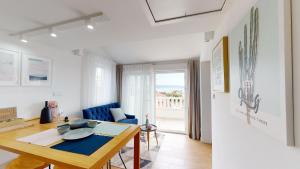 TV a/nebo společenská místnost v ubytování Villa Nono Penthouse Apartment
