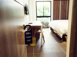 Ένα ή περισσότερα κρεβάτια σε δωμάτιο στο Alko Hotel Integrado