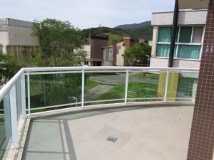 En balkon eller terrasse på Belíssimo resort com casa com banheiras água termal