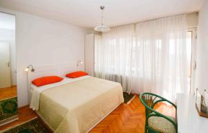 Postel nebo postele na pokoji v ubytování Apartment Pula 45