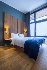 
En eller flere senger på et rom på Radisson Blu Mountain Resort & Residences, Trysil
