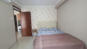 Cama ou camas em um quarto em Gateway Pasteur 2BR tower depan Ruby 7 C
