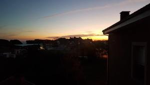 The sunrise or sunset as seen from a szállodákat or nearby