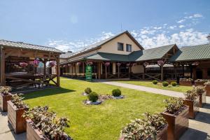 Vonkajšia záhrada v ubytovaní Praktik Hotel & Restaurant