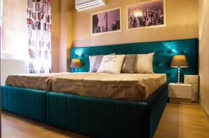 Ліжко або ліжка в номері Jorela Family Hotel