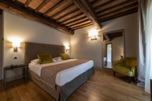 Postel nebo postele na pokoji v ubytování Relais Della Rovere