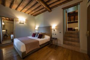 Postel nebo postele na pokoji v ubytování Relais Della Rovere