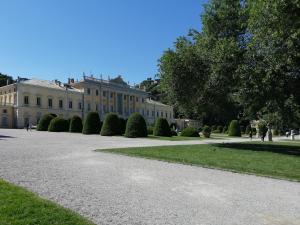 a large white building with a pathway in front of it at Vistalago 55 B in Como