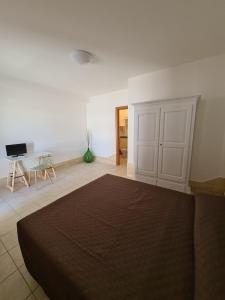 Postel nebo postele na pokoji v ubytování Donna Rosa B&B