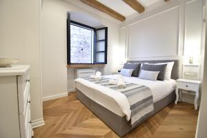 Posteľ alebo postele v izbe v ubytovaní Palace M