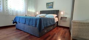 Postel nebo postele na pokoji v ubytování Blue Stella Luxury Apartment