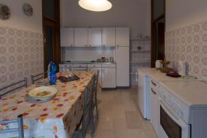 Kjøkken eller kjøkkenkrok på La Finestra sul Parco