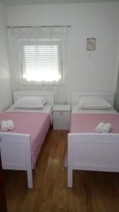 Postel nebo postele na pokoji v ubytování Apartment Domagoj