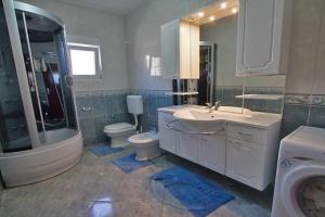 Koupelna v ubytování Apartment Domagoj