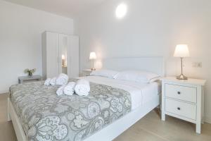 Postel nebo postele na pokoji v ubytování Apartment Azalea - Cremia