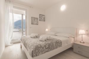 Postel nebo postele na pokoji v ubytování Apartment Azalea - Cremia