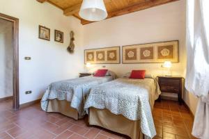 a bedroom with two beds in a room at ABETE in Pratovecchio +38 photos