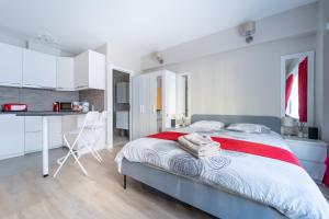Postel nebo postele na pokoji v ubytování Luxury Studio In the EU Area