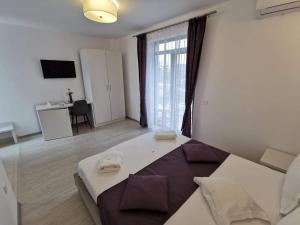Postel nebo postele na pokoji v ubytování Casa Loro