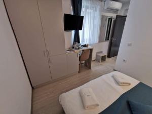 TV a/nebo společenská místnost v ubytování Casa Loro