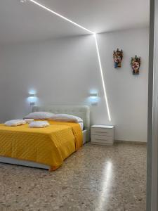 Posteľ alebo postele v izbe v ubytovaní Catania Apartment Borgo Suite Autonomous