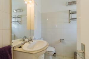 Phòng tắm tại Apartment Casa Alessandro mit Meerblick