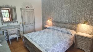 Postel nebo postele na pokoji v ubytování Agriturismo Pereti