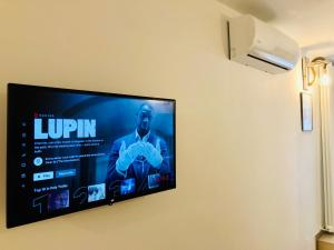 TV a/nebo společenská místnost v ubytování Atipico B&B