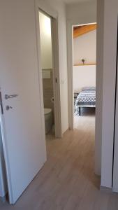Postel nebo postele na pokoji v ubytování Casa la Piazzetta Rinascimentale