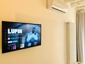 TV a/nebo společenská místnost v ubytování Atipico B&B
