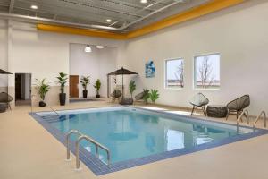 The swimming pool at or close to Microtel Inn and Suites by Wyndham Weyburn