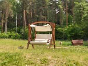 Vonkajšia záhrada v ubytovaní Leśny Dworek - Apartamenty SUPER z TV i salonem kominkowym