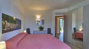 Posteľ alebo postele v izbe v ubytovaní Casa Lido Lake View