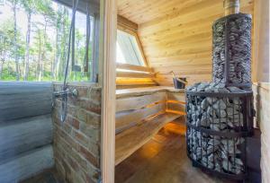 Palanda nebo palandy na pokoji v ubytování Nordicstay Noarootsi Saunahouse